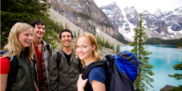 group of hikers in the mountains who are protected by the us canada tax treaty