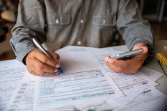 man claiming state tax rebates
